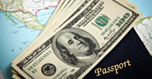 Infomoney - Vai viajar para o exterior Comprar dólar de última hora pode sair 7% mais caro
